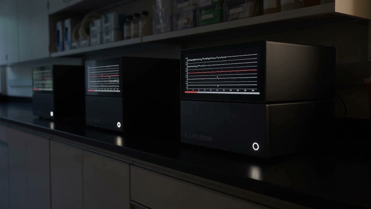 Several instruments operate overnight in a darkened room.